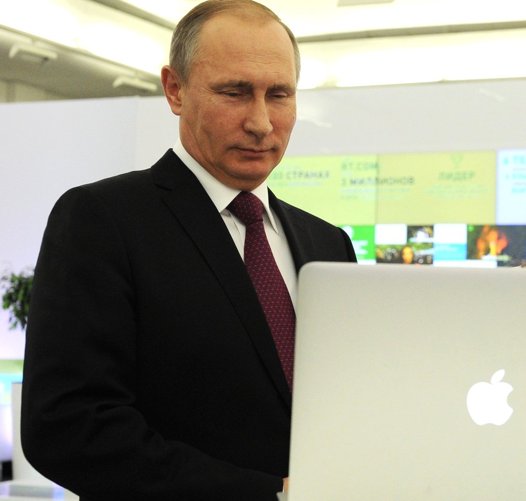 In online poll, Vladimir Putin wins People.com's “Sexiest Man Alive” title after one Russian IP address votes 930 million times