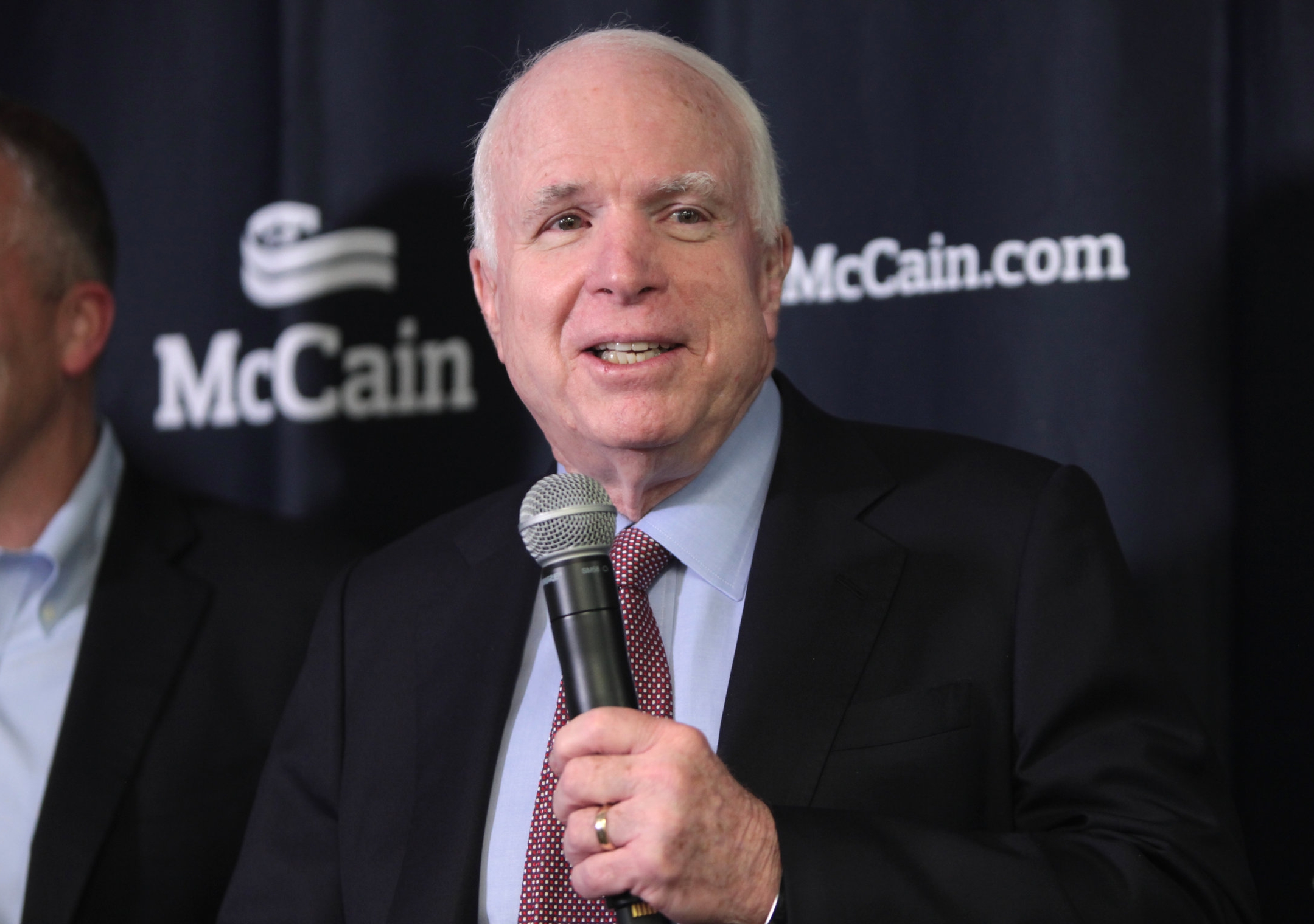 John McCain tells reporters he voted for Hillary Clinton