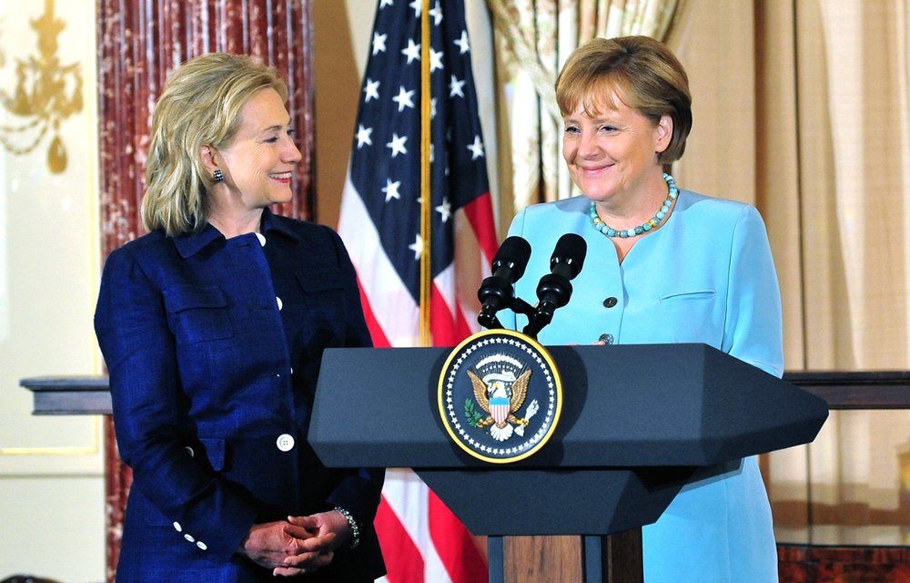 Clinton and Merkel achieve world peace by syncing menstrual cycles